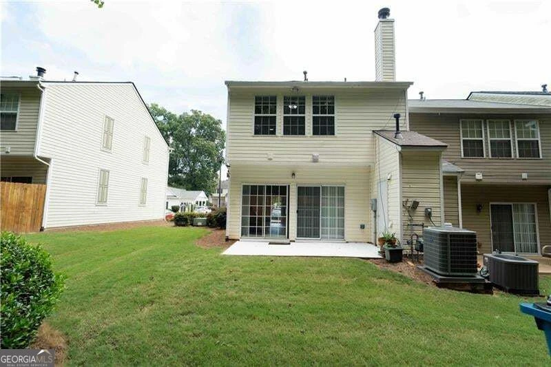 Rear exterior, patio and lawn at 2766 Ashleigh Lane